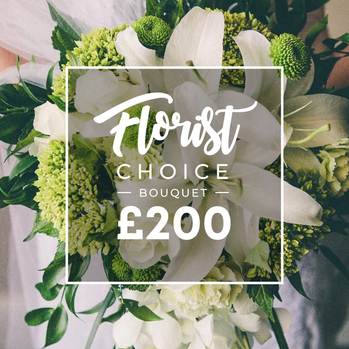 An artful hand-tied bouquet dominated by white lilies and lime-green clusters sits aloft a carpet of rich dark greens. The lilies rise gracefully, their long, smooth petals catching soft light, while the lime-green heads-dense and textural-contribute a modern, architectural note, like a living sculpture. Smaller white blooms, perhaps ranunculus or spray roses, weave through, adding delicate layers and subtle perfume. The greens are bold: Green Trick dianthus and green hydrangea-like clusters, all framed by eucalyptus and ruscus that lend depth and a natural, garden-fresh feel. The hand-tied arrangement is gathered with care, and a faint hint of a pale dress and arm appears in the softly blurred background, making the bouquet the clear focal point of the image. A white framed panel overlays the center of the photo, bearing Florist Choice Bouquet between two dashes in flowing script, with a large ?200 price at the bottom, signaling a premium offering from Flowers Mill Hill.
This arrangement exudes contemporary elegance with timeless appeal, suitable for weddings, anniversaries, or as a luxurious milestone gift. Delivered across Mill Hill, Hale, and surrounding neighbourhoods, the bouquet is crafted to arrive fresh and vibrant, its colours crisp and true, its textures rich and varied, and its presence sure to elevate any ceremonial setting or intimate celebration.