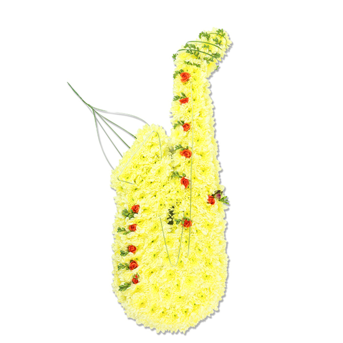 This detailed funeral tribute depicts a saxophone recreated entirely from fresh flowers, presented against a simple white background that allows the sculptural quality to shine. The instrument's body, from the broad bell at the bottom to the characteristic upward curve of the neck, is densely layered with tight yellow chrysanthemum heads. Each bloom is tucked closely next to its neighbour, forming a continuous, soft-textured surface that faithfully follows the instrument's flowing profile. Punctuating this bright yellow base are numerous small, rich red spray roses positioned where the saxophone's keys, clusters, and decorative elements would be, giving the impression of a carefully mapped pattern of notes. Slim strands of deep green foliage, perhaps ivy or similar trailing greenery, weave in and out along the edges and key lines, particularly around the bell and neck, providing contrast and helping to define the contours. Discreet silver or green wires can be glimpsed near the mouthpiece and within some of the curves, hinting at the fine craftsmanship and internal framework that keep the design in perfect balance. The overall effect is both striking and tender, a piece that might sit at the front of a chapel or crematorium service in Mill Hill as a focal tribute to a devoted musician, jazz aficionado, or music teacher cherished in the local community. The yellow chrysanthemums carry associations of joy, appreciation, and shared memories, while the red roses speak of deep respect and affection. Together they form a unique musical memorial, echoing the kind of melodies that might once have drifted over the green spaces and quiet streets around Mill Hill and nearby Totteridge.