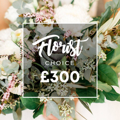 From a Mill Hill studio comes a bespoke Florist Choice bouquet, a quiet symphony of cream and pale pink. The image centers on a white rectangular frame bearing the text 'Florist Choice'-'Florist' in a flowing script and 'CHOICE' in clean uppercase-set just above the bold '?300' price. The arrangement beyond the frame holds creamy blossoms in generous, cloud-like heads that might be garden roses, peonies, or ranunculus, all in soft ivory with subtle hints of pale blush. Interlacing with these are smaller white flowers such as lisianthus or campanula that add delicate texture. The bouquet breathes with lush greenery: silvery-green eucalyptus in broad, rounded leaves; olive branches that thread through the stems; and clusters of pale-green berries that give a fresh note to the composition. Toward the center sits a focal element-an emerald-dark, almost purplish ornamental kale or a striking succulent-that introduces a modern, architectural twist. The overall mood is natural and refined, a balance of abundance and restraint, crafted with the know-how of a florist who understands how light, scent, and form work together. Soft peach and cream tones in the background blur gently, allowing the bouquet's vitality to shine. For Mill Hill residents seeking a premium, on-trend gift or a wedding centerpiece, this Florist Choice option embodies luxury, versatility, and dependable delivery, available across Mill Hill and neighbouring North London communities, often with same-day service. Flowers Mill Hill brings a skilled hand and a local sensibility to every stem.