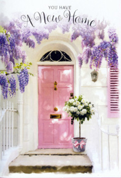 A beautifully composed entranceway in Mill Hill is captured here, evoking the excitement and calm nerves of moving into a new home. Overhead, generous swathes of wisteria tumble down in soft, fragrant strands, their blossoms clustered in shades of lavender, lilac, and faint mauve. These delicate blooms form a romantic arch against whitewashed walls that glow gently, akin to the bright, tidy frontages you might see walking from Mill Hill East station toward the high street. Sitting confidently at the centre is a charming pink door, painted in a muted, rosy pastel that feels both modern and timeless. Its surface seems smooth and slightly matte, catching the daylight in an inviting way. A matching shutter enhances the harmony of the scene, echoing the same blush tone and reinforcing the home's gentle, welcoming character. On the doorstep, a grey metal bucket holds an abundant arrangement of white and cream roses, their velvety petals layered and full, suggesting careful selection by an experienced florist. Sprays of soft, silvery green foliage peek through, adding texture and a touch of garden freshness, reminiscent of nearby Mill Hill parklands. A pale pink ribbon encircles the bucket, tied simply yet beautifully. The entirety of the composition feels like a thoughtful housewarming gesture-perhaps delivered by a local flower shop for someone settling into a quiet cul-de-sac off Holders Hill Road. It conveys a sense of gratitude, optimism, and comfort, as though every petal and leaf is helping to bless the new home with peace and happiness.