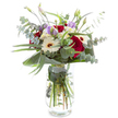 This bouquet, infused with the welcoming spirit of Mill Hill, brings together radiant red roses-rich with meaning and warmth-alongside crisp white gerbera daisies that illuminate the arrangement with a sense of peace and cheer. Blush-toned lisianthus, some just beginning to unfurl, add a gentle, cloudlike softness, echoing pink-and-lavender sunsets above the rooftops. Eucalyptus leaves, cool and round, wind elegantly throughout, lending structure and a hint of refreshing woodland aroma that's familiar to walkers in the local parks. Strong, glossy aspidistra leaves form a cradle at the base, with one distinct leaf curving for a modern, polished finish. The glass vase, transparent and curved, puts every stem on display in clear water-a symbol of freshness and care from the local Mill Hill florist. Whether chosen for an anniversary, a birthday, or to express gratitude, this bouquet is as timeless as it is contemporary, perfect for sharing a touch of beauty and serenity with friends and neighbors throughout the NW7 community.