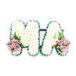 A refined funeral letter tribute in this image spells out MA in two bold, uppercase letters, carefully designed for a dignified farewell. Each letter is generously filled with white chrysanthemums, arranged so closely that their rounded heads form a continuous, softly textured surface. The blooms' small, intricate petals give a feeling of gentle fluffiness, like a cushioned blanket of flowers offering quiet comfort. Around the outer edge of both the M and the A runs a narrow, dark green border, likely created with ruffled ribbon or slim foliage. This deep green outline crisply defines the shape of the letters, adding contrast and a polished finish that would stand out in a funeral cortege travelling along Mill Hill Broadway or towards a nearby place of rest. At the lower edges of the tribute, subtle flashes of colour draw the eye. On the left base of the M and the right base of the A, small yet expressive bouquets have been added. These feature soft pink roses, lilac-toned roses, and dainty pink spray roses, arranged together to form rounded, romantic clusters. Their layered petals and pastel hues lend softness and tenderness to the design, while slender fern fronds extend delicately from underneath, adding freshness and a light, airy movement. Set against a plain white backdrop, the tribute feels calm and composed, with every element working in harmony. It conveys love, respect, and remembrance in a visually simple yet emotionally rich way, appropriate for funeral services, memorials, or graveside tributes in the Mill Hill area.