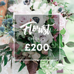 From the sunlit edge of Mill Hill this stunning Florist Choice bouquet sits as if catching the last glow of a spring afternoon. The arrangement speaks of premium, bespoke design, anchored by a soft white overlay at its center bearing Florist CHOICE and the price ?200 in elegant, understated type. The palette sits in soft pastels and muted tones, a refined harmony that feels crafted for a special celebration rather than a routine gesture.
At the heart are fully open light pink garden roses, paired with creamy white anemones whose centers are a dramatic, nearly black dot of color, and subtly lavender grey roses that lend modern depth. A touch of spiky blue eryngium thistles introduces a cool accent and architectural texture. Lush foliage surrounds the blooms - slender eucalyptus like leaves and darker burgundy leaves - giving the bouquet body, movement, and a natural, garden fresh feel.
Overall the arrangement reads as substantial and high value, the kind of piece a skilled designer would curate for a wedding, anniversary, or meaningful gift. The background is gently blurred, implying an outdoor setting with soft natural light that lets every petal and vein on a leaf glow. For Mill Hill deliveries and nearby NW7 postcodes, this Florist Choice would be a trusted, designer led choice ready to brighten a room or a celebration with quiet elegance. The bouquet carries a delicate rose scent and a hint of crisp greenery, inviting touch and lingering memory.