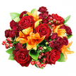 Seen from directly above against a clean white background, this classic, rounded bouquet reads as a study in warm intensity: deep, velvety red roses form the heart of the composition, their petals unfurling in layered spirals that catch the soft studio light. Bright orange Asiatic lilies punctuate the arrangement with trumpet-shaped blooms and visible stamens, some opened wide and others still in elegant buds, creating a lively rhythm between the large rose heads. Smaller clusters of burgundy spray roses weave through the design, their tight, jewel-toned flowers adding plush texture and a richer, wine-like depth that anchors the palette. Scattered among the blooms are glossy ruby hypericum berries, smooth and reflective, offering tiny points of light and a playful, festive counterpoint to the velvety petals. Broad, glossy green foliage-likely ruscus or salal-peeks out between stems, giving the bouquet volume, tonal contrast, and a fresh, leafy scent beneath the floral notes. The overall effect is warm and celebratory: red and orange tones suggest romance, autumnal cheer, or an anniversary gift meant to command attention on a mantel or dining table. The lighting is even and soft, which preserves the tactile quality of each blossom and reveals subtle shadows in the rose centers and the lilies' curled edges. As a local Mill Hill arrangement, this bouquet would sit equally well in a flat near The Broadway or as a centrepiece for a gathering at Mill Hill Park, offering a visual and fragrant embrace that feels simultaneously opulent and comfortably familiar.
