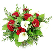 An elegant bouquet of deep red roses and crisp white calla lilies is captured in a clear, studio-style photograph against a bright white background, the slightly raised eye-level perspective showing off its full, rounded form. The arrangement appears lush and abundant, with numerous velvety red roses gathered at the centre, their rich crimson petals tightly layered in classic, romantic spirals that suggest deep affection and passion. Among and slightly above them, white calla lilies stand gracefully, their smooth, sculptural trumpet-shaped blooms curving outward to reveal pale, creamy-yellow spadices that add a subtle warmth to the cool white. This interplay of intense red and pure white creates a refined contrast, giving the bouquet a timeless, almost cinematic quality, as if it were designed for a special evening in a Mill Hill home near the quiet avenues off Page Street. Encircling the focal flowers, a tapestry of greenery adds freshness and movement: slender sprigs of eucalyptus with round, silvery-green leaves lend a light, contemporary feel, while more substantial, emerald-toned foliage fills out the shape and enhances the sense of fullness. All stems are gathered into a simple clear glass vase at the base; the top of the vase is entirely concealed by the blooms, leaving only the gently ribbed base visible at the bottom of the image. Soft, even lighting bathes the composition, highlighting the satin-like texture of the lilies and the plush, almost velour quality of the rose petals, with minimal shadow. The bouquet conveys a mood of sophisticated romance and would be ideal for anniversaries, proposals, or luxurious gifts delivered across Mill Hill by local florists who understand the area's elegant, village-like charm.