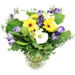A breathtakingly vibrant and richly textured floral bouquet, bursting with cheerful yellows, elegant whites, and serene purples, is expertly arranged in a classic clear glass cylindrical vase. The arrangement prominently features several large-headed yellow Gerbera daisies with distinct dark centers, drawing the eye with sunny radiance. Nestled among them are pristine white Calla lilies, their smooth trumpet-shaped blooms lending a touch of refined elegance. Interspersed are clusters of soft lavender Lisianthus, some fully open with ruffled petals and others in graceful bud form, adding depth and a whisper of movement. Smaller white Alstroemeria, trimmed with delicate yellow streaks, provide delicate texture and brightness. A lush foundation of greenery-broad glossy leaves, airy sprigs of eucalyptus, and other fresh foliage-gives structure and a natural, garden-fresh feel. The clear glass vase keeps the stems visible and the water crystal clear, a quiet reminder of the bouquet's freshness. The whole arrangement exudes joy, purity, and celebratory warmth, making it ideal for birthdays, anniversaries, or brightening a home or desk. Set against a crisp white backdrop, the colors sing with daylight clarity, while the bouquet's handcrafted balance reflects the care of a Mill Hill florist crafting with pride for the neighbourhood. This gift is available for same-day delivery across Mill Hill and nearby wards, bringing a moment of sunshine to front rooms and shared spaces.