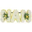 A carefully modelled, three-dimensional sympathy tribute spelling the word NAN in bold, capital letterforms, each letter built from a dense carpet of small, pristine white chrysanthemum florets that read as soft, cloudlike texture. Around the edge of every letter a bright ring of smaller, sunny yellow button-style blooms provides a cheerful yet respectful contrast, the yellow punctuating the white like sunlight at the edge of a cloud. The two N letters are gently enhanced with compact foliage clusters - glossy deep-green leaves and slender fern fronds nestle beside tight yellow buds or miniature roses, giving each outer letter a warm focal point while the central A remains deliberately unadorned, its pure white surface framed only by the yellow halo. A discreet dark green support bar runs behind the upper sections, keeping the lettering steady for standing display, and the whole piece sits against a clean white backdrop so colours and textures read clearly. The scent is quietly floral and fresh, the chrysanthemums offering a soft, slightly green note while the yellow blooms add a faint, honeyed sweetness; the glossy foliage gives a cool, earthy contrast beneath the petals. This is the sort of personalised letter tribute often chosen for a funeral, memorial or graveside service to honour a much-loved nan, conveying purity, light and gentle recollection. As a local Mill Hill floral designer I picture it carried from Mill Hill Cemetery to a service at nearby Christ Church or placed on a memorial table in Mill Hill Village - a composed, comforting emblem of remembrance that balances dignity with warmth and seasonal freshness.