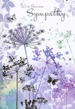 The artwork on this sympathy card carries the hush of a peaceful meadow, translated into soft watercolour hues that resonate with the tranquil corners of Mill Hill. Slender, slightly curved stems rise from the lower edge, each crowned with an umbel of tiny blossoms that fan out in intricate, lace-like patterns. These floral forms are painted in layered shades of lavender, dusky blue, and muted green-grey, their tips so delicately rendered that they appear to melt into the background. That background itself is a gentle sweep of cool purples and soft blues, brushed in broad, semi-transparent strokes that leave no hard lines, only a sense of distance and quiet air. Here and there, small butterflies drift among the flowers, their wings softly tinted in complementary tones, as if reflecting the light of an overcast sky. Their subtle presence lends the composition a whisper of movement and the suggestion of ongoing life. The overall lighting is diffuse, as though the scene were lit by the last light of day, encouraging a mood of reflection rather than drama. Empty spaces between stems and blooms are carefully maintained, creating a visual rhythm that feels unhurried and composed, similar to strolling along a quiet road off Mill Hill Broadway when the town has grown still. As a local florist who often helps families choose sympathy flowers that speak gently rather than loudly, I see in this card a kindred spirit. It offers compassion through its calm palette and graceful lines, becoming a respectful, soothing way to express deep condolences when spoken words alone are not enough.
