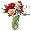 With its captivating mix of plush, richly coloured blooms, this bouquet expertly channels the welcoming character of Mill Hill's neighbourhood florists. The centre draws you in: three large, peach-toned roses, their petals lush and velvety, glow gently at the arrangement's heart, reminiscent of the soft embrace of morning light in the gardens off Bittacy Hill. Flanking these are luxurious, deep burgundy chrysanthemums; their layered petals create an aura of elegance and depth that's both comforting and dramatic. Wisps of baby's breath appear like a soft snowfall, their clusters of tiny, airy white flowers diffusing the bolder colours and enhancing the sense of lightness. Framing it all are verdant, glossy leaves and artful sprigs of eucalyptus, which release a subtle herbal scent that recalls crisp park walks and country breezes along The Ridgeway. The stems are arranged naturally in a clear glass vase, with a casual tangle that honours both freshness and authenticity. This bouquet, ideally suited for romantic gestures, birthday surprises, or as an expression of heartfelt support, brings both sophistication and gentle charm to any Mill Hill setting-making each delivery a unique, handcrafted experience tailored for the local community.